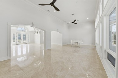 Experience grand living in this stately, reimagined residence on Laurel Oak Country Club in Florida - for sale on GolfHomes.com, golf home, golf lot