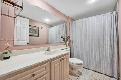 This 2 bedroom 2 bathroom 4th floor Whitehall Condo overlooking on Pine Island Ridge Country Club in Florida - for sale on GolfHomes.com, golf home, golf lot