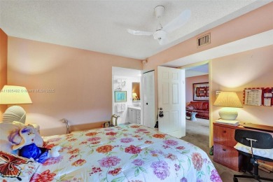 This 2 bedroom 2 bathroom 4th floor Whitehall Condo overlooking on Pine Island Ridge Country Club in Florida - for sale on GolfHomes.com, golf home, golf lot