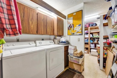 This 2 bedroom 2 bathroom 4th floor Whitehall Condo overlooking on Pine Island Ridge Country Club in Florida - for sale on GolfHomes.com, golf home, golf lot