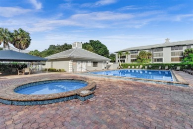 This 2 bedroom 2 bathroom 4th floor Whitehall Condo overlooking on Pine Island Ridge Country Club in Florida - for sale on GolfHomes.com, golf home, golf lot