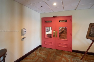 This 2 bedroom 2 bathroom 4th floor Whitehall Condo overlooking on Pine Island Ridge Country Club in Florida - for sale on GolfHomes.com, golf home, golf lot
