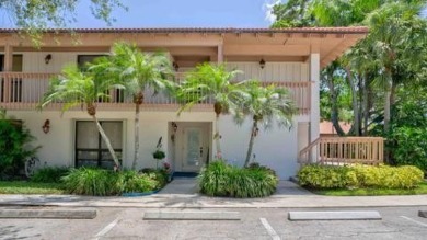 Experience luxury living at 419 Brackenwood Lane South, a on PGA National Golf Club in Florida - for sale on GolfHomes.com, golf home, golf lot