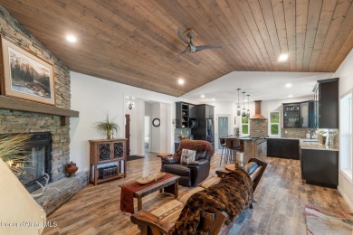 Discover lakefront living at its finest on Lake San Souci! This on Stoneridge Golf Club in Idaho - for sale on GolfHomes.com, golf home, golf lot