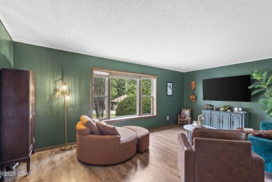 This 3-bedroom, 2-bath home has 1,676 sq. ft. of living space on Bella Vista Country Club and Golf Course in Arkansas - for sale on GolfHomes.com, golf home, golf lot