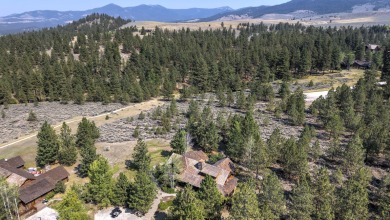 Welcome to the Cayuse Cabin. This lovely 4-bedroom, 4-bathroom on Stock Farm Club in Montana - for sale on GolfHomes.com, golf home, golf lot