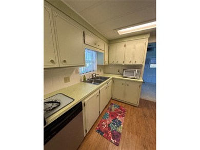 55+ Gated golf course community large 2 bedroom 2 bath home on a on Zellwood Station Country Club in Florida - for sale on GolfHomes.com, golf home, golf lot