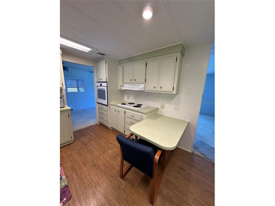 55+ Gated golf course community large 2 bedroom 2 bath home on a on Zellwood Station Country Club in Florida - for sale on GolfHomes.com, golf home, golf lot