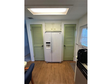 55+ Gated golf course community large 2 bedroom 2 bath home on a on Zellwood Station Country Club in Florida - for sale on GolfHomes.com, golf home, golf lot