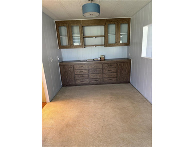 55+ Gated golf course community large 2 bedroom 2 bath home on a on Zellwood Station Country Club in Florida - for sale on GolfHomes.com, golf home, golf lot