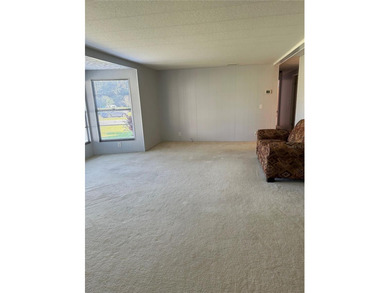 55+ Gated golf course community large 2 bedroom 2 bath home on a on Zellwood Station Country Club in Florida - for sale on GolfHomes.com, golf home, golf lot