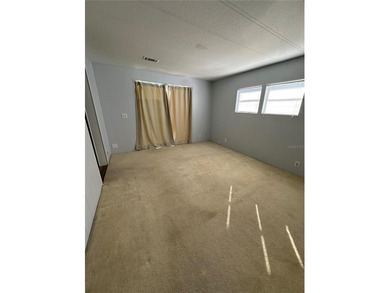 55+ Gated golf course community large 2 bedroom 2 bath home on a on Zellwood Station Country Club in Florida - for sale on GolfHomes.com, golf home, golf lot