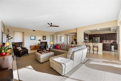 Discover refined Florida living at 23619 Awabuki Drive in the on Sarasota National Golf Club in Florida - for sale on GolfHomes.com, golf home, golf lot