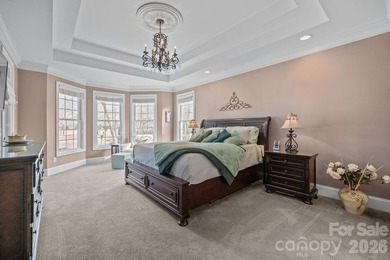 This five-bedroom, four-and-a-half-bathroom full brick home is on Emerald Lake Golf Club in North Carolina - for sale on GolfHomes.com, golf home, golf lot