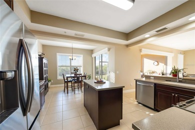 Discover refined Florida living at 23619 Awabuki Drive in the on Sarasota National Golf Club in Florida - for sale on GolfHomes.com, golf home, golf lot