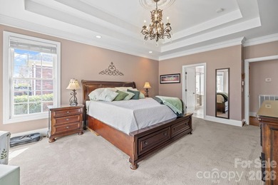 This five-bedroom, four-and-a-half-bathroom full brick home is on Emerald Lake Golf Club in North Carolina - for sale on GolfHomes.com, golf home, golf lot