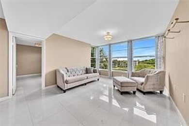 Lakefront Golf Course Condo. Move-in ready and beautifully on Pine Island Ridge Country Club in Florida - for sale on GolfHomes.com, golf home, golf lot