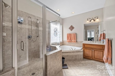 This five-bedroom, four-and-a-half-bathroom full brick home is on Emerald Lake Golf Club in North Carolina - for sale on GolfHomes.com, golf home, golf lot