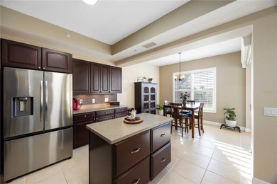 Discover refined Florida living at 23619 Awabuki Drive in the on Sarasota National Golf Club in Florida - for sale on GolfHomes.com, golf home, golf lot