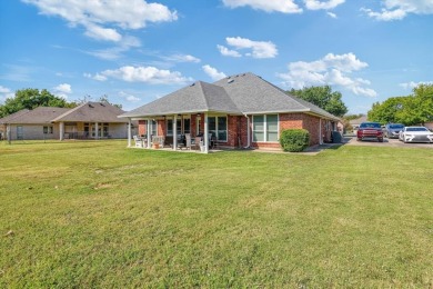 Discover this charming 3-bedroom, 2-bath home on a peaceful on Pecan Plantation Country Club in Texas - for sale on GolfHomes.com, golf home, golf lot