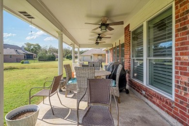 Discover this charming 3-bedroom, 2-bath home on a peaceful on Pecan Plantation Country Club in Texas - for sale on GolfHomes.com, golf home, golf lot