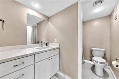 Lakefront Golf Course Condo. Move-in ready and beautifully on Pine Island Ridge Country Club in Florida - for sale on GolfHomes.com, golf home, golf lot