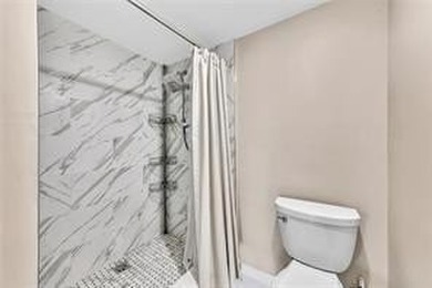 Lakefront Golf Course Condo. Move-in ready and beautifully on Pine Island Ridge Country Club in Florida - for sale on GolfHomes.com, golf home, golf lot