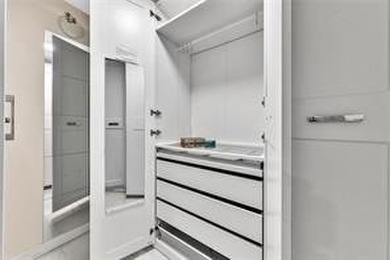 Lakefront Golf Course Condo. Move-in ready and beautifully on Pine Island Ridge Country Club in Florida - for sale on GolfHomes.com, golf home, golf lot