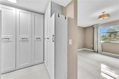 Lakefront Golf Course Condo. Move-in ready and beautifully on Pine Island Ridge Country Club in Florida - for sale on GolfHomes.com, golf home, golf lot