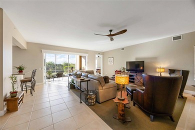 Discover refined Florida living at 23619 Awabuki Drive in the on Sarasota National Golf Club in Florida - for sale on GolfHomes.com, golf home, golf lot