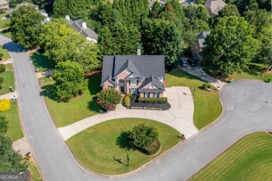 Welcome to this stunning 7-bedroom home located in the very on Woodmont Golf and Country Club in Georgia - for sale on GolfHomes.com, golf home, golf lot