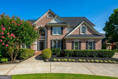 Welcome to this stunning 7-bedroom home located in the very on Woodmont Golf and Country Club in Georgia - for sale on GolfHomes.com, golf home, golf lot