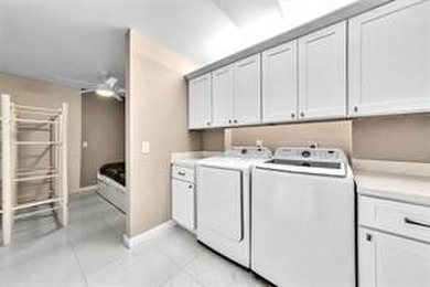 Lakefront Golf Course Condo. Move-in ready and beautifully on Pine Island Ridge Country Club in Florida - for sale on GolfHomes.com, golf home, golf lot