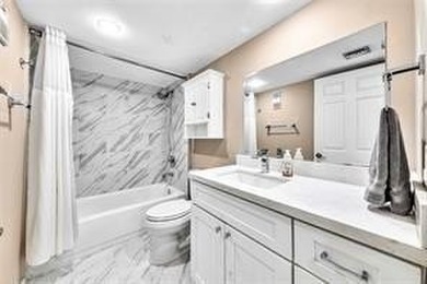 Lakefront Golf Course Condo. Move-in ready and beautifully on Pine Island Ridge Country Club in Florida - for sale on GolfHomes.com, golf home, golf lot