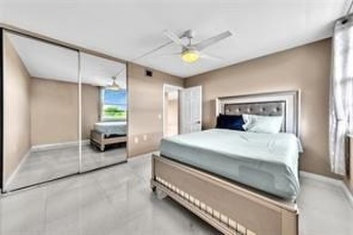 Lakefront Golf Course Condo. Move-in ready and beautifully on Pine Island Ridge Country Club in Florida - for sale on GolfHomes.com, golf home, golf lot