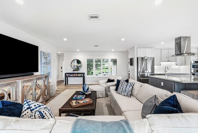 Beautifully reimagined 2-bedroom, 2-bath residence set on the on Quail Ridge Golf Course and Country Club in Florida - for sale on GolfHomes.com, golf home, golf lot