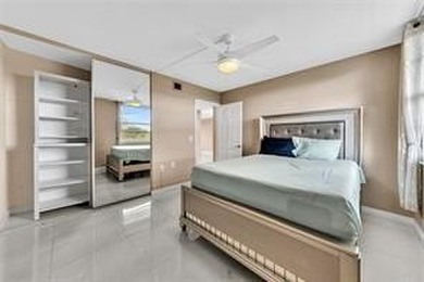 Lakefront Golf Course Condo. Move-in ready and beautifully on Pine Island Ridge Country Club in Florida - for sale on GolfHomes.com, golf home, golf lot