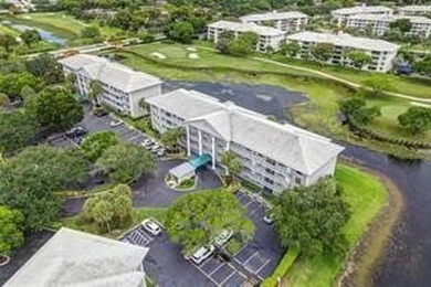Lakefront Golf Course Condo. Move-in ready and beautifully on Pine Island Ridge Country Club in Florida - for sale on GolfHomes.com, golf home, golf lot