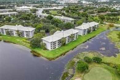 Lakefront Golf Course Condo. Move-in ready and beautifully on Pine Island Ridge Country Club in Florida - for sale on GolfHomes.com, golf home, golf lot