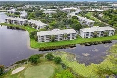 Lakefront Golf Course Condo. Move-in ready and beautifully on Pine Island Ridge Country Club in Florida - for sale on GolfHomes.com, golf home, golf lot