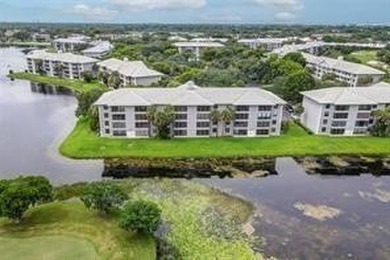 Lakefront Golf Course Condo. Move-in ready and beautifully on Pine Island Ridge Country Club in Florida - for sale on GolfHomes.com, golf home, golf lot