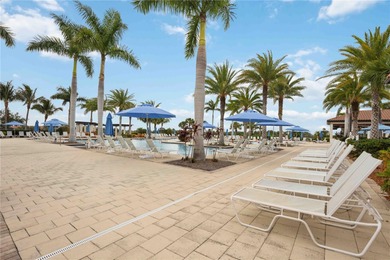 Discover refined Florida living at 23619 Awabuki Drive in the on Sarasota National Golf Club in Florida - for sale on GolfHomes.com, golf home, golf lot