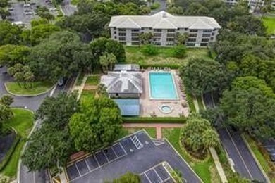 Lakefront Golf Course Condo. Move-in ready and beautifully on Pine Island Ridge Country Club in Florida - for sale on GolfHomes.com, golf home, golf lot
