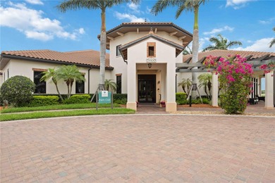 Discover refined Florida living at 23619 Awabuki Drive in the on Sarasota National Golf Club in Florida - for sale on GolfHomes.com, golf home, golf lot