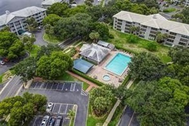 Lakefront Golf Course Condo. Move-in ready and beautifully on Pine Island Ridge Country Club in Florida - for sale on GolfHomes.com, golf home, golf lot