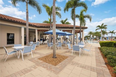 Discover refined Florida living at 23619 Awabuki Drive in the on Sarasota National Golf Club in Florida - for sale on GolfHomes.com, golf home, golf lot