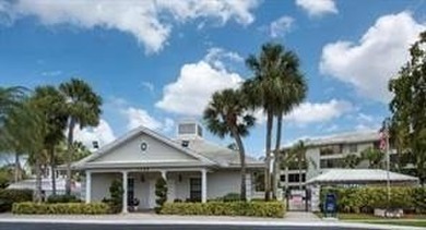 Lakefront Golf Course Condo. Move-in ready and beautifully on Pine Island Ridge Country Club in Florida - for sale on GolfHomes.com, golf home, golf lot