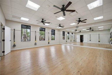 Discover refined Florida living at 23619 Awabuki Drive in the on Sarasota National Golf Club in Florida - for sale on GolfHomes.com, golf home, golf lot