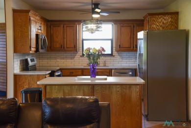 Perfectly positioned on the Hole 16 tee box, this beautifully on Chaparral Country Club in New Mexico - for sale on GolfHomes.com, golf home, golf lot