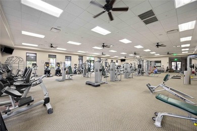 Discover refined Florida living at 23619 Awabuki Drive in the on Sarasota National Golf Club in Florida - for sale on GolfHomes.com, golf home, golf lot